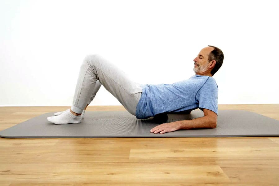 Exercises for back pain using a fascial roller 2