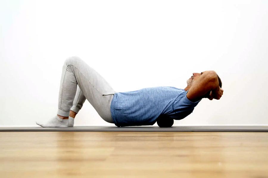 Relaxing all the back muscles (using a ball or roller)-1