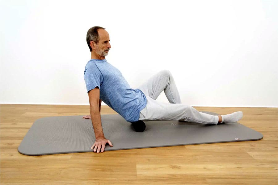Exercises-for-back-pain-using-a-fascial-roller-1.jpg